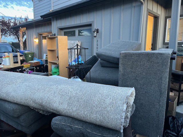 Furniture and bulky items from a property cleanout.